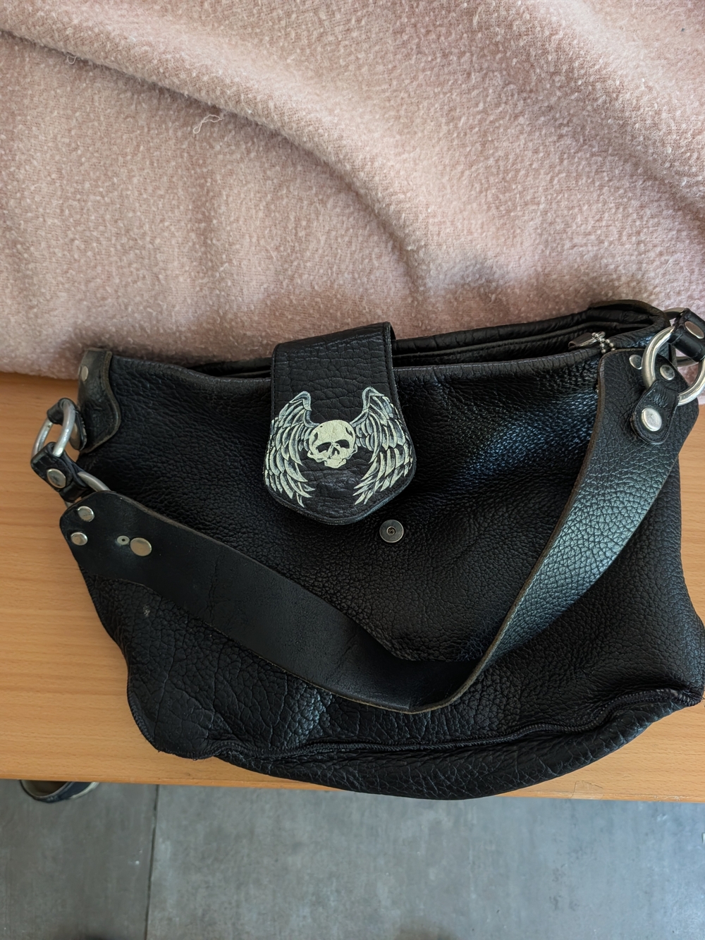 Tylie Malibu Black Leather Shoulder Bag with Skull Wing Accent